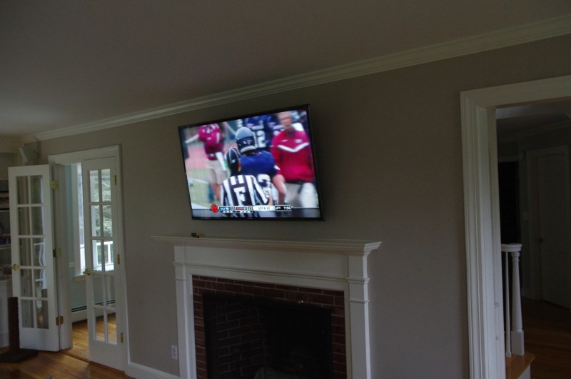 Wide View of TV Mounted over Fireplace